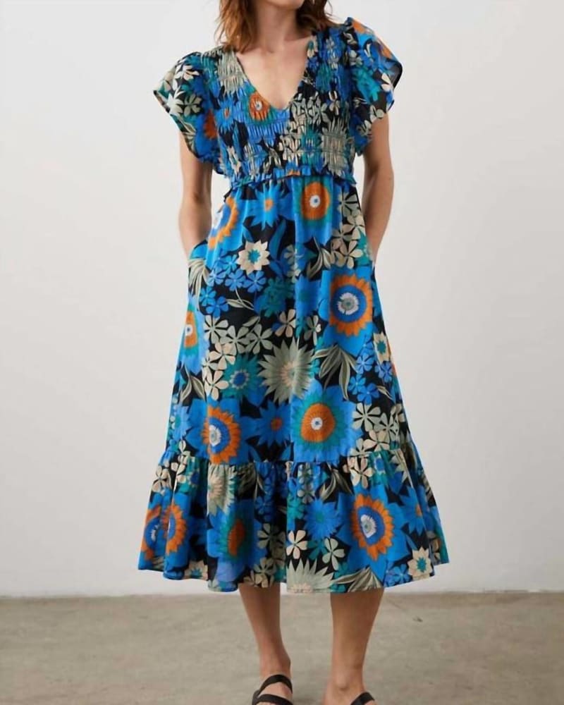 Front of a model wearing a size XL Clementine Cotton Midi Dress in Azul Wildflower in Azul Wildflower by Rails. | dia_product_style_image_id:334943